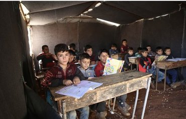 Displaced Syrian children bear brunt of war's psychological, physical impact