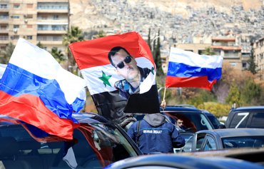نظام الأسد يساعد روسيا وإيران لتجنيد السوريين الضعفاء كمرتزقة