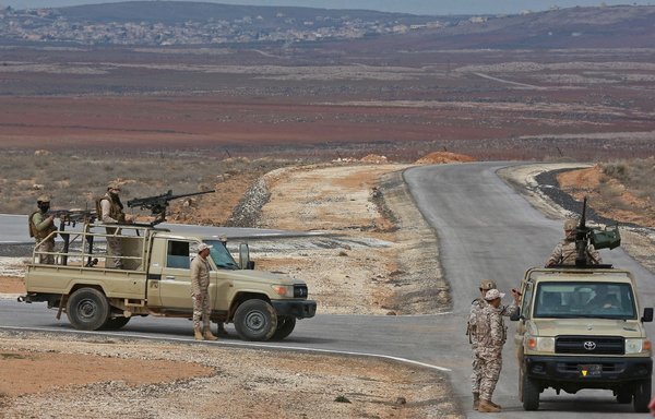 Since the beginning of this year, Jordan's army, which includes the troops seen here during a February 17 patrol, has killed 30 smugglers and foiled attempts to smuggle 16 million Captagon pills into the kingdom from Syria, the military said. [Khalil Mazraawi/AFP]