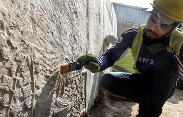 کشف نقوش باستانی در بنای تاریخی عراق که داعش آن را با بولدوزر تخریب کرده بود